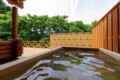 Natural Hot Spring with Log house - Kaga - Japan Hotels