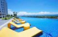 Beautiful Sea and Pool View Mactan Newtown Condos - Cebu - Philippines Hotels