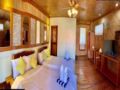 Comfort Quadruple Room (beach front area) - Palawan - Philippines Hotels