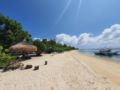 Pili Beach Resort, Beach Front Deluxe Bungalow - Romblon - Philippines Hotels